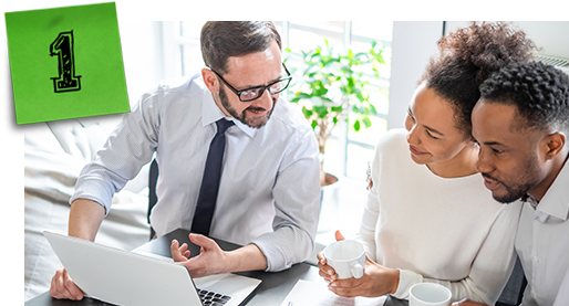 Financial planner and clients reviewing goals and gathering information